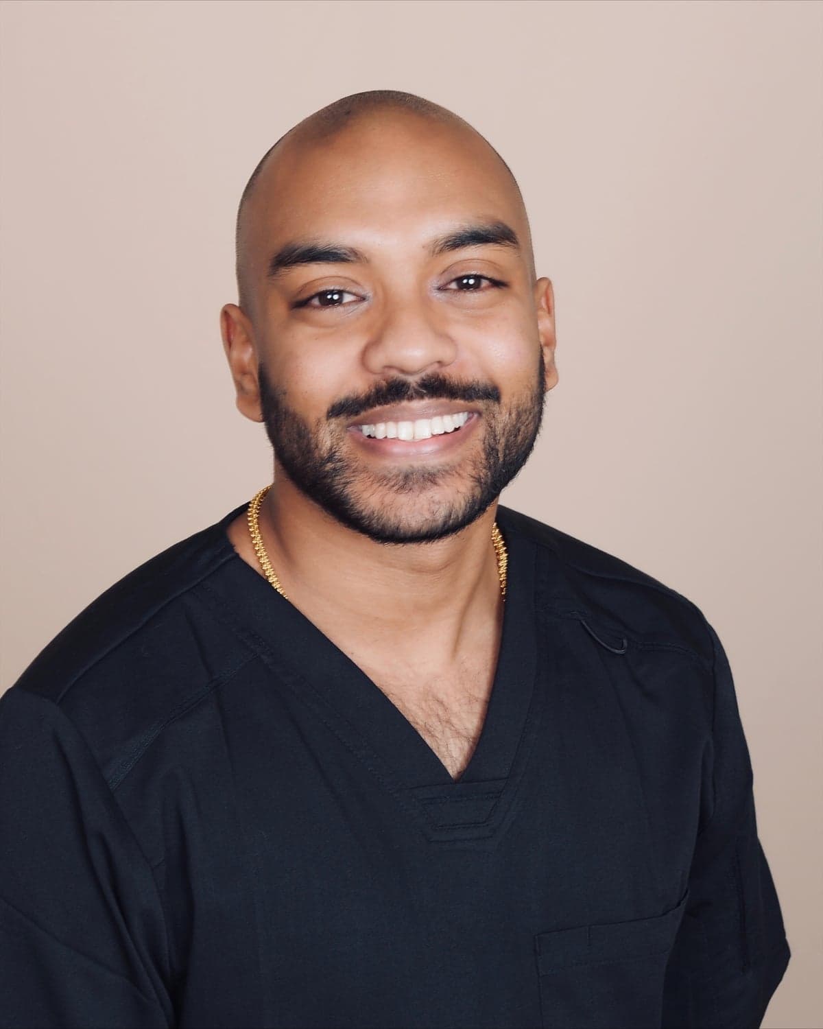 Headshot of Dr. Mani, DPT, Clinical Director at Thera Performance Lab in Lake Orion, MI